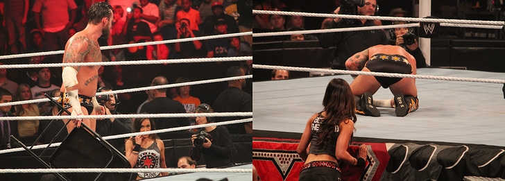 プロレスラーのCMパンクと女子プロレスラー“WWEディーバ”のAJリー(2012年・米国ルイジアナ州ニューオーリンズ・WWE「マンデーナイトロウ」)の画像